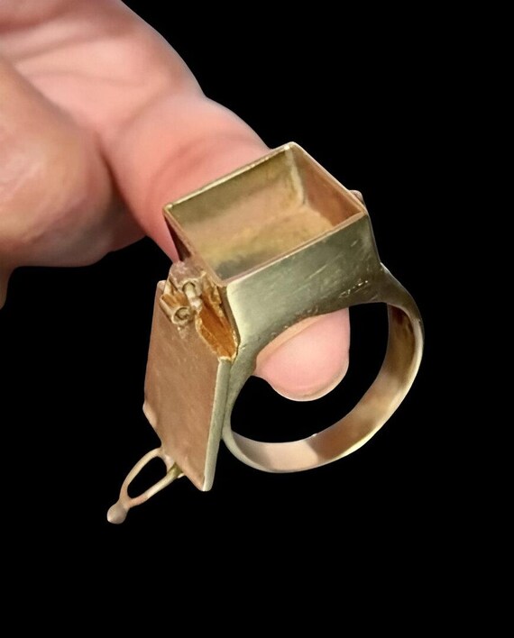 A brass ring with a hidden secret compartment — steampunk craftsmanship meets Victorian mystery box on your finger.
