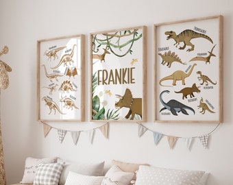May include: Three framed dinosaur prints with illustrations of different dinosaurs. The middle print has the name Frankie in the center. The prints are hanging on a white wall above a wooden bench with storage bins.