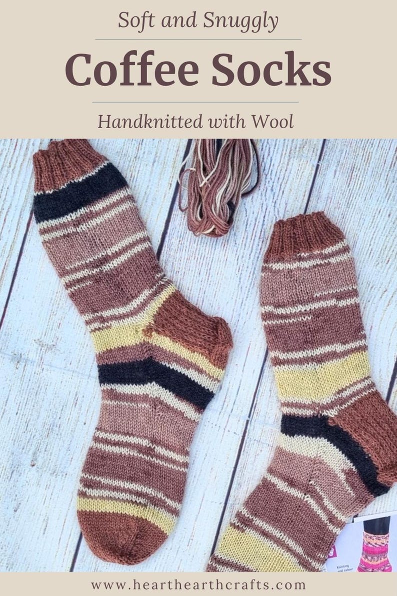 May include: A pair of handknitted wool socks featuring horizontal stripes in shades of brown, black, and cream. The text Soft and Snuggly Coffee Socks Handknitted with Wool and www.hearthearthcrafts.com is visible on the image.
