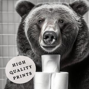May include: A black and white photo of a bear looking directly at the camera. The bear is holding a stack of toilet paper rolls in front of it. The text "HIGH QUALITY PRINTS" is on a white circle in the lower left corner of the image.