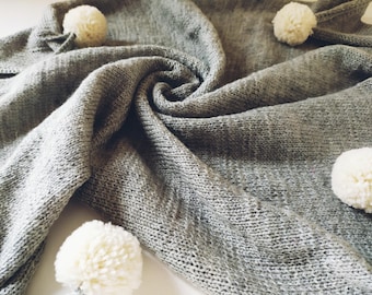 Manta de bebé de lana merino tejida a mano: Ropa de cama suave para la habitación del bebé.
