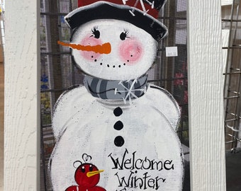 Snowman painted on screen.