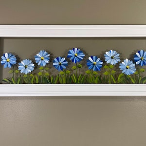 Blue flowers painted on glass. image 1