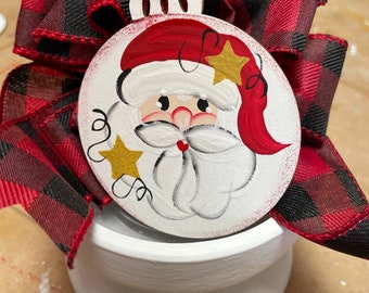 Round Santa head ornament.