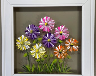 Gerber daisies painted on glass.