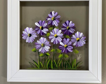 Purple daisies painted on glass.