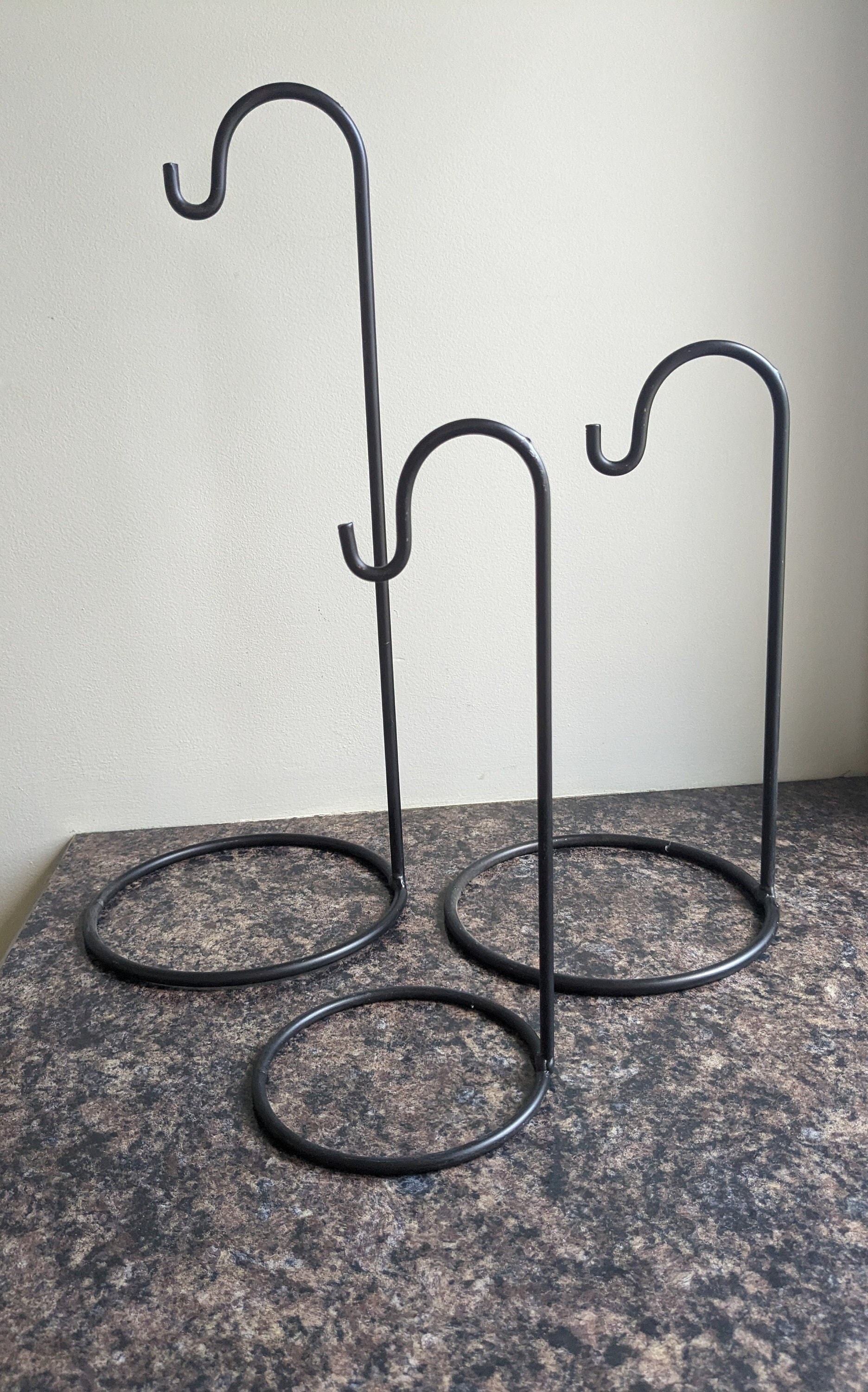 Wrought iron stand with hook deals