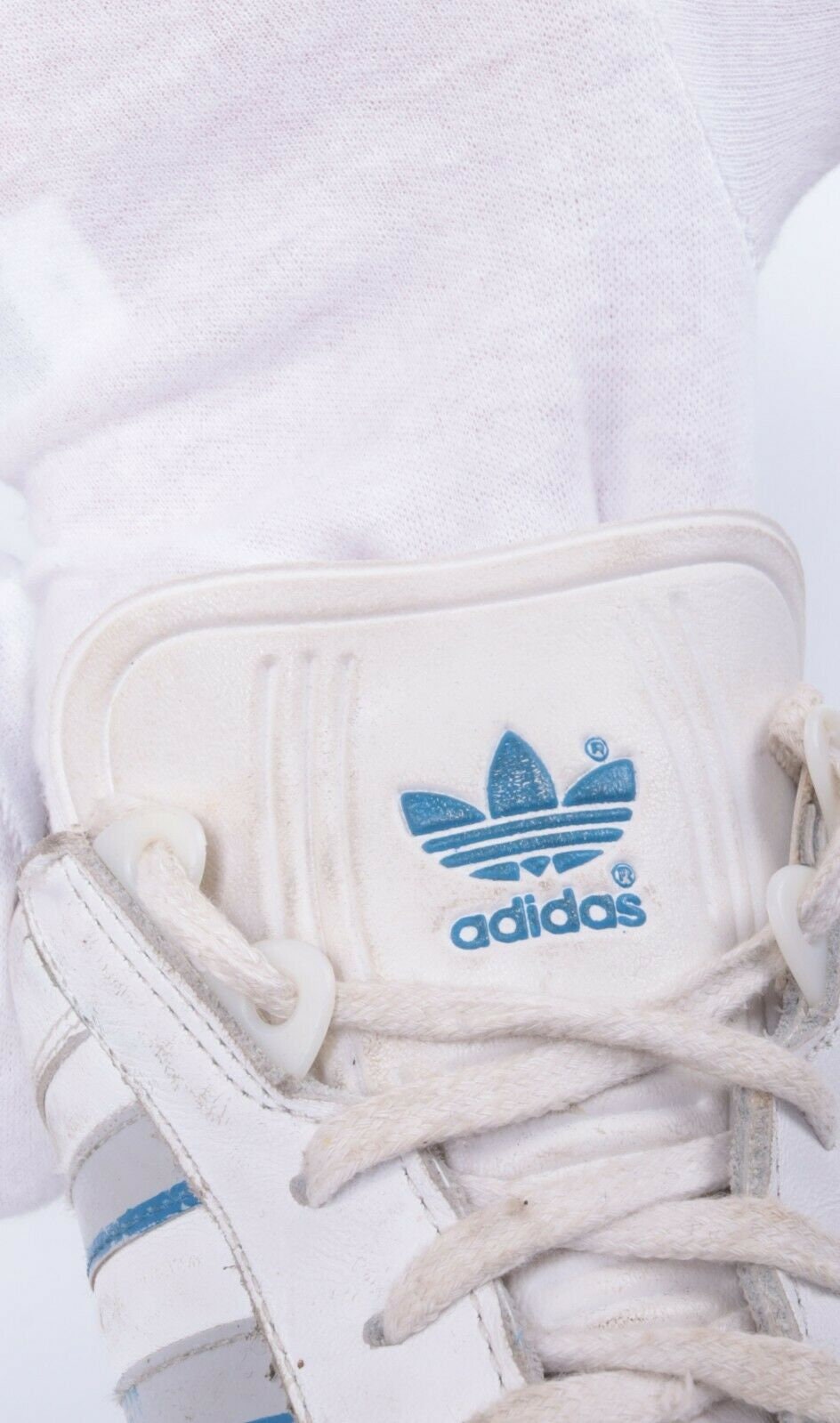 old school white adidas shoes