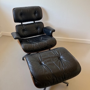Eames Lounge Chair and Ottoman in Brazilian Rosewood Black Leather