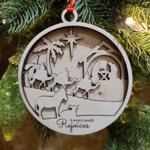 Nativity ornament. A weary world rejoices