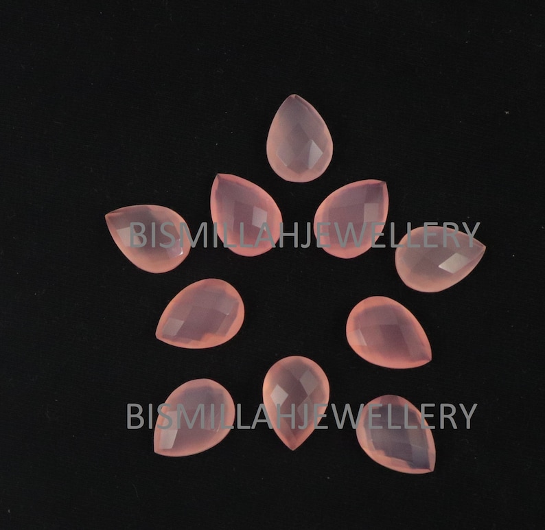 May include: Ten pink teardrop-shaped chalcedony gemstone beads. The beads are faceted and have a translucent appearance.
