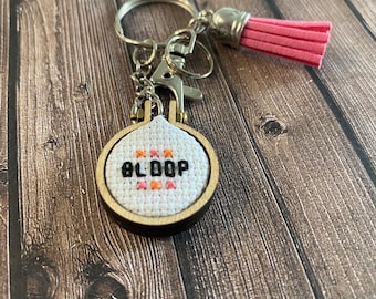 Bloop Nene Leakes quote cross stitch keychain. Bloop Bag charm. Planner charm. Purse charm. Gift for Real Housewives of Atlanta fan