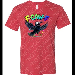 May include: Red t-shirt featuring a cartoon crow with open wings and the text "F-CAW-F" in colorful graffiti-style lettering. The crow is black with yellow feet and is surrounded by colorful paint splatters.