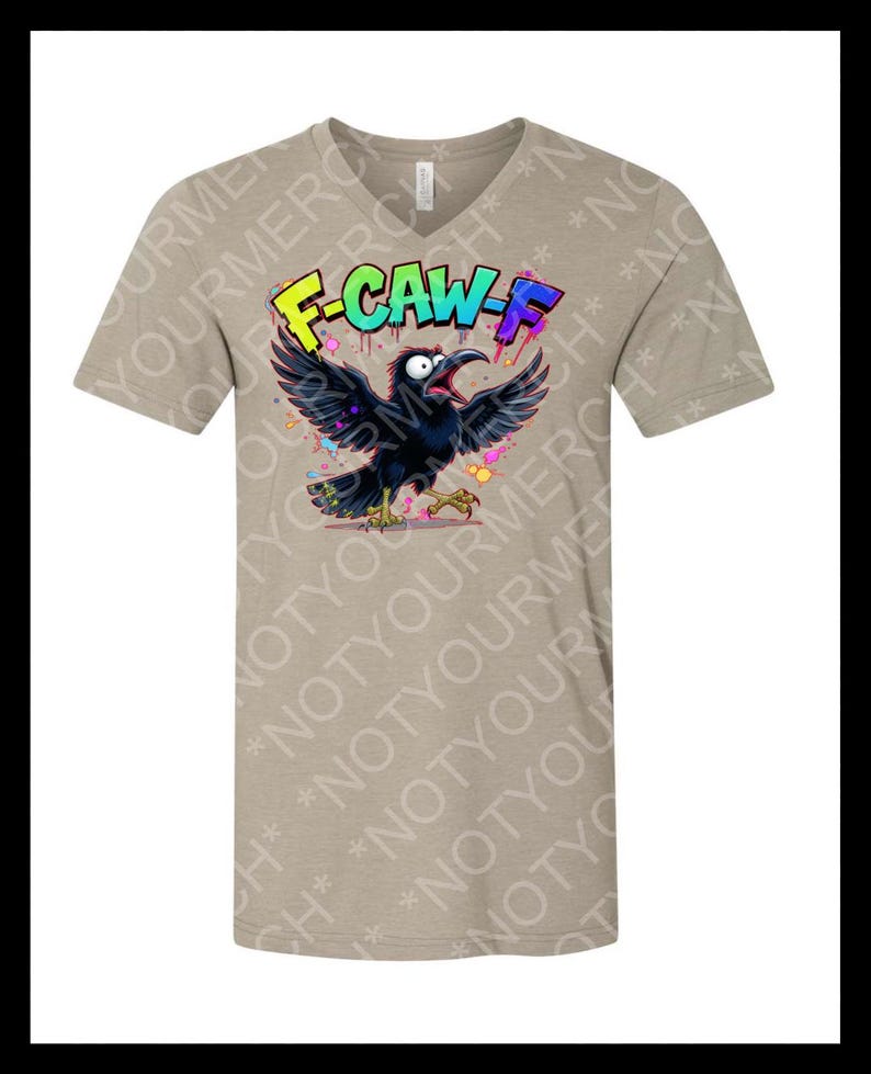 May include: A tan V-neck t-shirt featuring a cartoon crow with open wings and a wide open beak. The crow is black with yellow feet and is surrounded by colorful confetti. The text "F-CAW-F" is above the crow in a graffiti style.