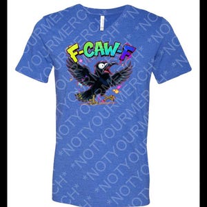 May include: Blue V-neck t-shirt with a graphic of a black crow with its wings spread, screaming. The text "F-CAW-F" is above the crow in colorful letters. The shirt has a heathered texture.