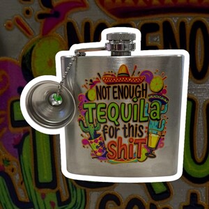 May include: Stainless steel flask with a screw-on cap and attached chain. The flask features a colorful graphic with a sombrero, cactus, and the text "NOT ENOUGH TEQUILA for this shit".