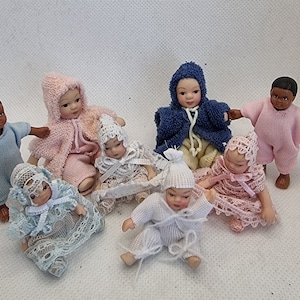 Dolls house miniatures &#39;Dolly Day Care&#39; Posable Porcelain, Vinyl Babies and Toddlers in their cute lace and cotton outfits