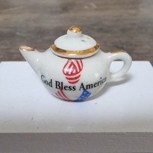 Dolls house miniatures &#39;Anyone for Tea&#39; RARE Rachel Munday Tea pot &#39;God Bless Amercia&#39; plus Display Wall Unit Shelf Porcelain Teapots plus