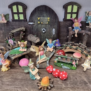 Dolls house miniature &#39;Believe&#39; A collection of fairy miniatures, fairies, mushrooms, bridge, door, windows, fireside, tree swing, table etc