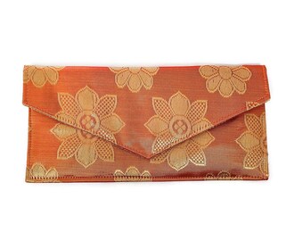 Handmade upcycled sari clutch evening bag with floral print, ethically handcrafted in India