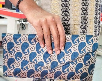 Handmade upcycled sari clutch evening bags with unique prints, ethically handcrafted in India