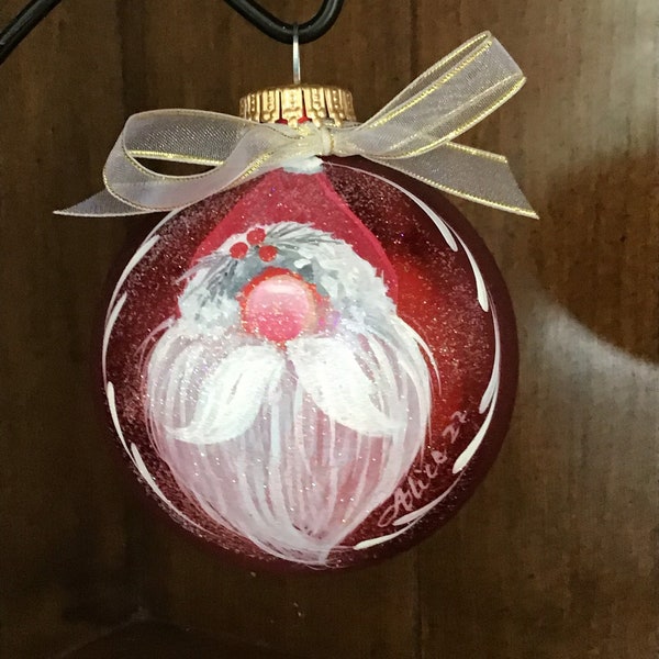 Hand painted glass Christmas ornament with a gnome Santa