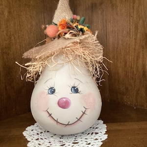 Hand painted and carved scarecrow gourd luminary