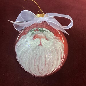 Christmas glass bulb ornament with gift box, string hanger included