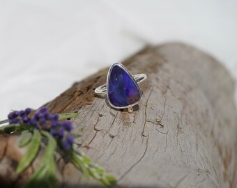 Sterling silver ring with a natural Australian boulder opal with a 9ct yellow gold accent