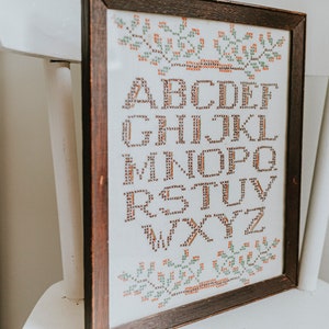 Framed Cross Stitch Alphabet Sampler | ABC Embroidery | Dark Wood Framed Floral and Alphabet Cross-Stitch