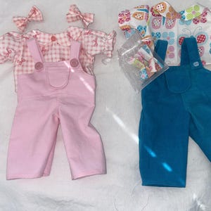 Pink corduroy overalls w/ Pink Bow Blouse and Blue Corduroy Overalls w/Flower blouse w/ bows:Cabbage Patch 16 - 18" and Bitty Baby 15" Dolls
