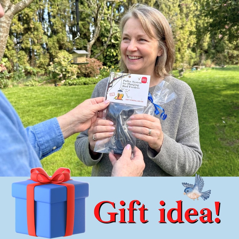 May include: A pulley system for hanging bird feeders packaged in a clear plastic bag with a white header card. The card features the text Pulley System for Hanging Bird Feeders, Out on a Limb, and Easy to install and use, with a small bird feeder graphic.
