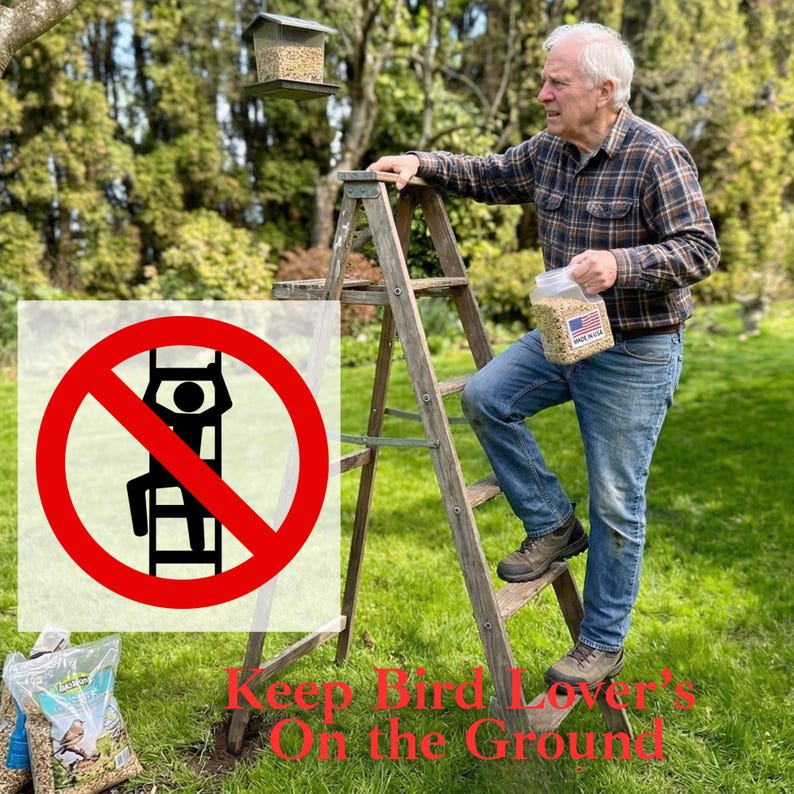 May include: A wooden stepladder with a red circular prohibition sign featuring a black icon of a person climbing a ladder. The text reads Keep Bird Lover's On the Ground. A clear plastic container of birdseed with a Made in USA flag label is held.