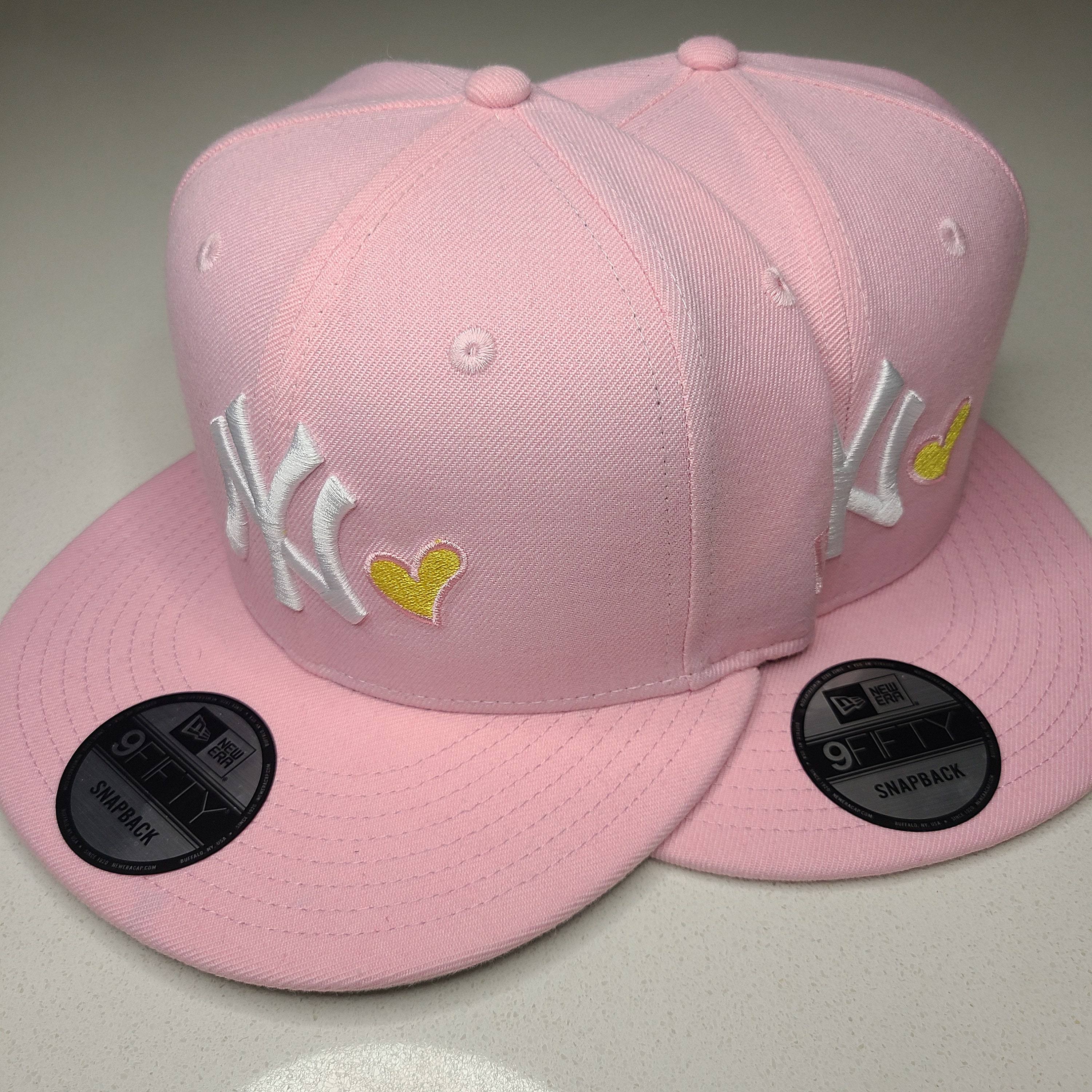 pink fitted yankee hat