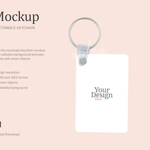 May include: White rectangle keychain mockup with a silver ring and a metal clasp. The text "Your Design here" is printed on the keychain.