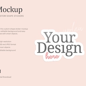 May include: Mockup of a custom shape sticker with the text "Your Design here" in gray and pink on a white background. The sticker is on a light pink background. The text "Mockup" and "Custom Shape Stickers" is at the top of the image. The text "Get this custom shape sticker mockup with editable background and easy to use with smart objects." is below the sticker. The text "High resolution", "PSD and JPEG format", "Smart objects", and "Editable background" is listed below the text. The text "Ps" and "Digital Download" is at the bottom of the image.