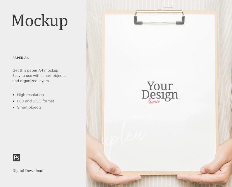 May include: A white A4 paper mockup on a clipboard held by a person's hands. The paper has the text "Your Design here" in the center. The background is a light brown striped fabric.