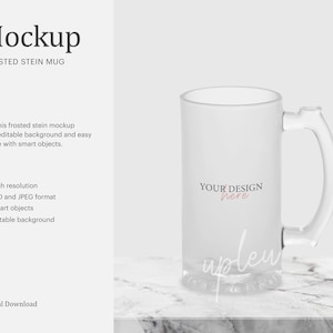 May include: A frosted glass stein mug mockup with a white background. The mug has a handle and the text "YOUR DESIGN here" is printed on the front. The text "uplew" is written in cursive on the bottom of the mug.