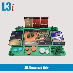 May include: A green board game organiser with various game pieces, cards, and dice. The organiser has slots for cards, tokens, and dice. The text "GURNEY HALLECK HOUSE ATREIDES" is visible on a card. The text "STL Download Only" is at the bottom.