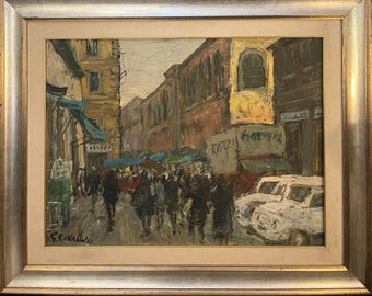 Pode incluir: Pintura a óleo de uma cena de rua europeia com edifícios, pessoas e carros. A obra de arte é apresentada numa moldura dourada e inclui uma assinatura no canto inferior esquerdo. Os edifícios são pintados em tons de castanho, amarelo e bege.
