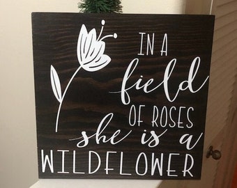 In a field of roses she is a wildflower, Nursery Sign, Living Room Signs, Home Decor Sign, Wood Sign with Vinyl, Stained Wood Sign