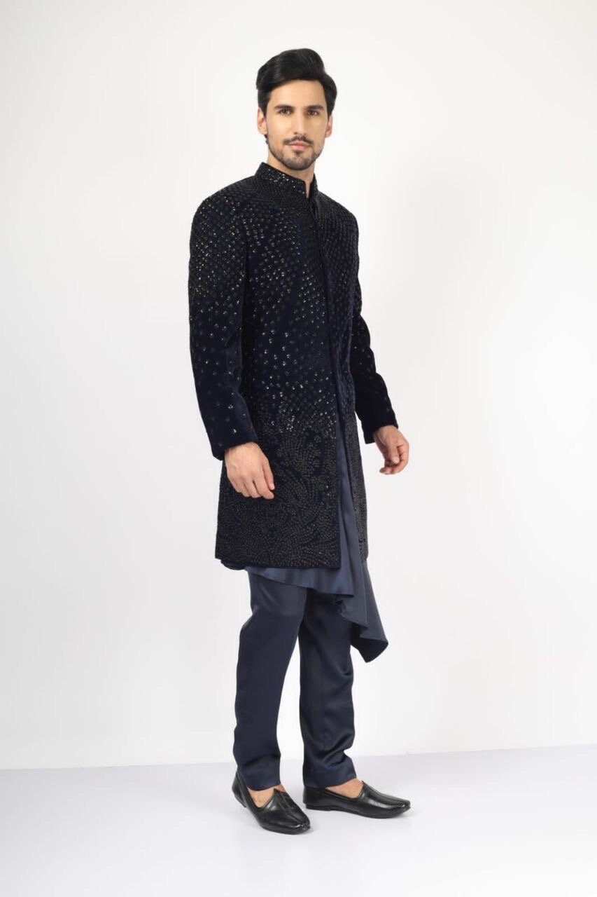 ranveer singh in a black embroidered sherwani