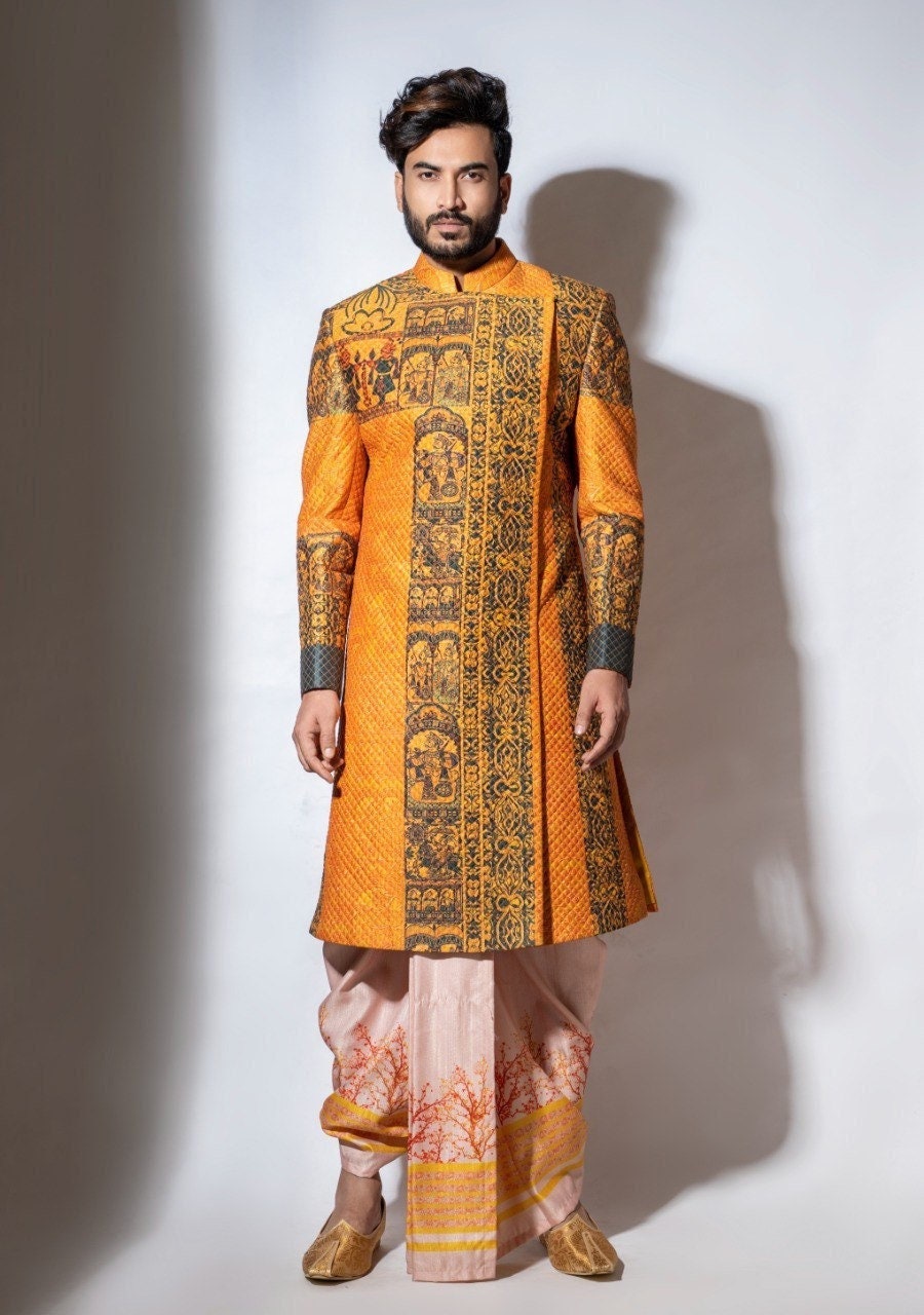 Orange sherwani for groom discount