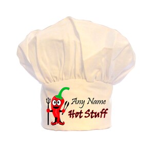 May include: White chef's hat with a red chilli pepper cartoon holding a trident and a fork. The text "Any Name Hot Stuff" is printed on the hat.