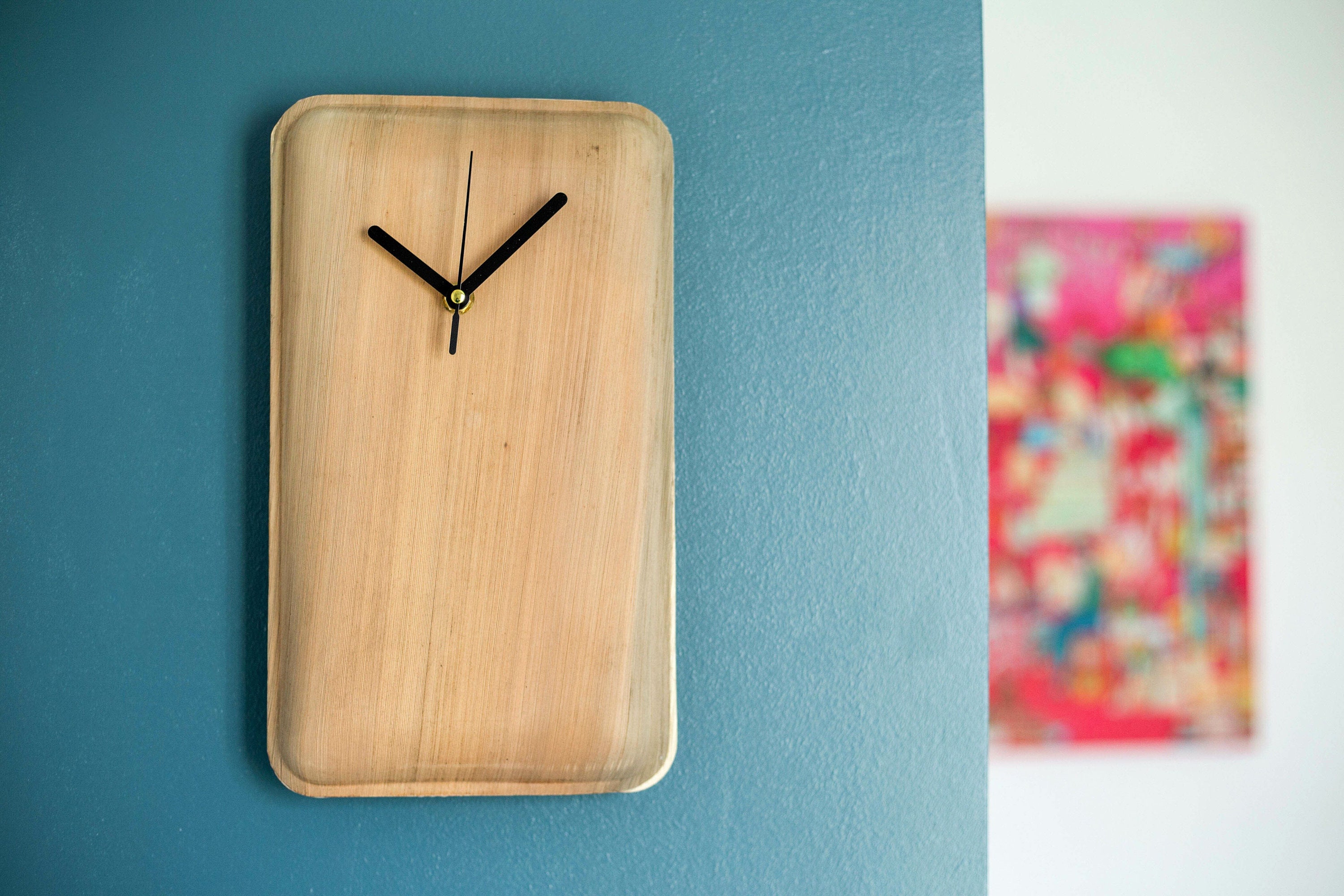 Grande Horloge Faite à Partir de Feuilles Palmier
