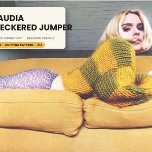 May include: An oversized chunky knit jumper with a yellow and olive green checkered pattern. The text on the image reads: KLAUDIA CHECKERED JUMPER, OVERSIZED CHUNKY KNIT, BEGINNER FRIENDLY, 12.5MM, KNITTING PATTERN, 12. The jumper is worn with leopard print leggings.