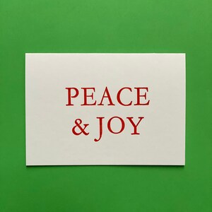 Cartolina di Natale tipografica » PEACE & JOY » Cartolina stampata a mano con tipografia elegante per dire semplicemente Buon Natale