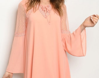 peach color gown with sleeves