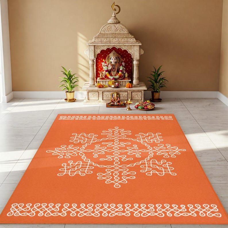 May include: An orange rug with a white geometric design. The rug has a border of white circles and a larger central design of white circles and lines.