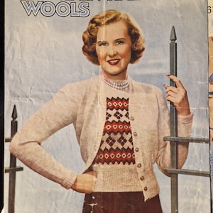 May include: Vintage advertisement for Mountain Maid Wools featuring a woman wearing a light pink cardigan over a patterned sweater and a dark skirt. The leaflet number is 230, and the price is 6 pence.